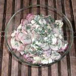 Russian salad with ham and radish
