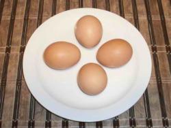  four chicken eggs